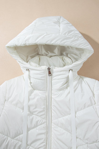 Manteau matelassé blanc à capuche zippé