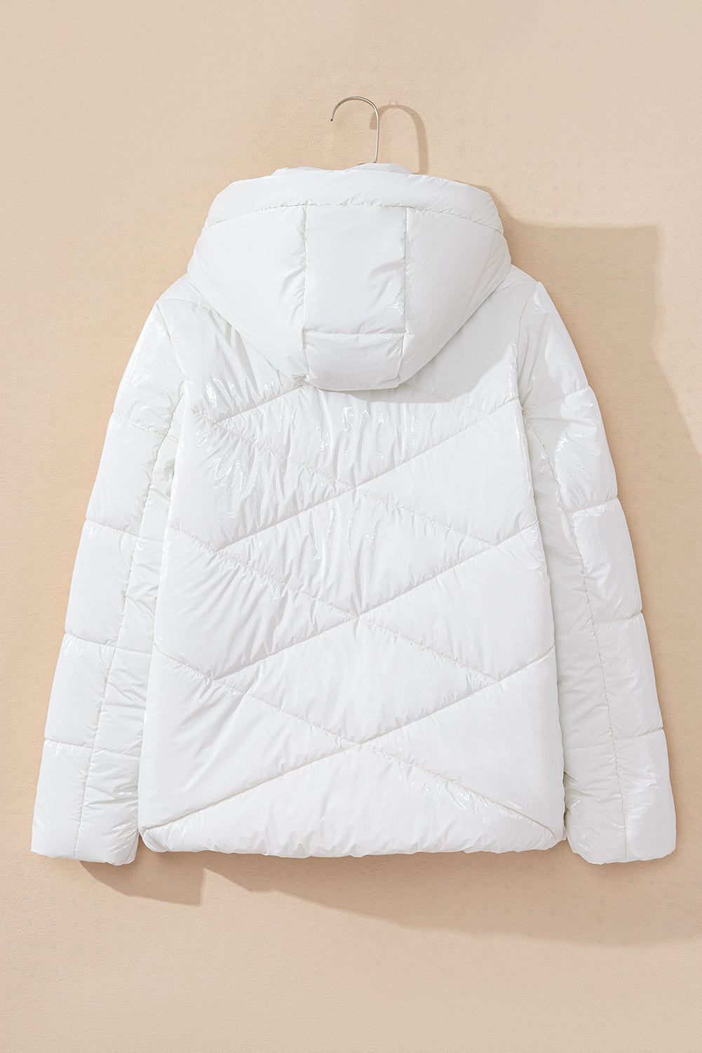 Manteau matelassé blanc à capuche zippé