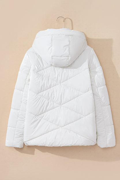 Manteau matelassé blanc à capuche zippé