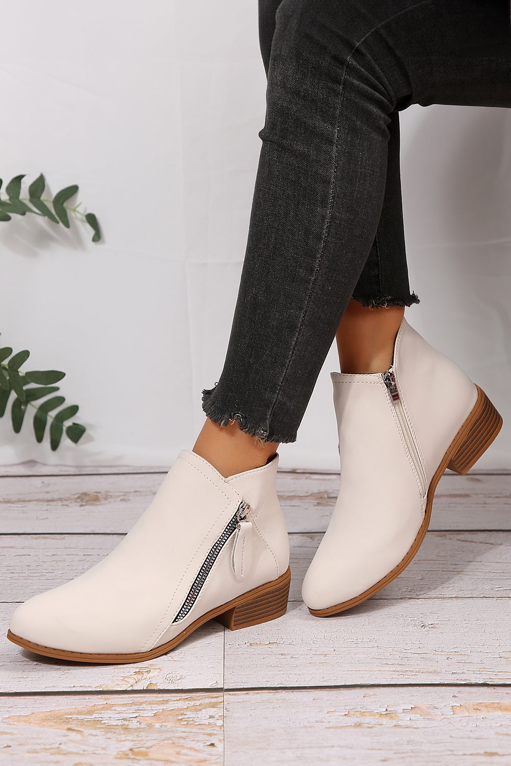 Bottines en similicuir blanc à talon bas avec double fermeture éclair