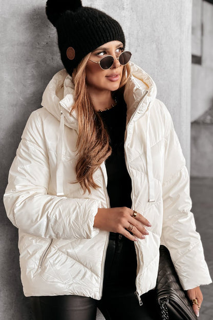 Manteau matelassé blanc à capuche zippé